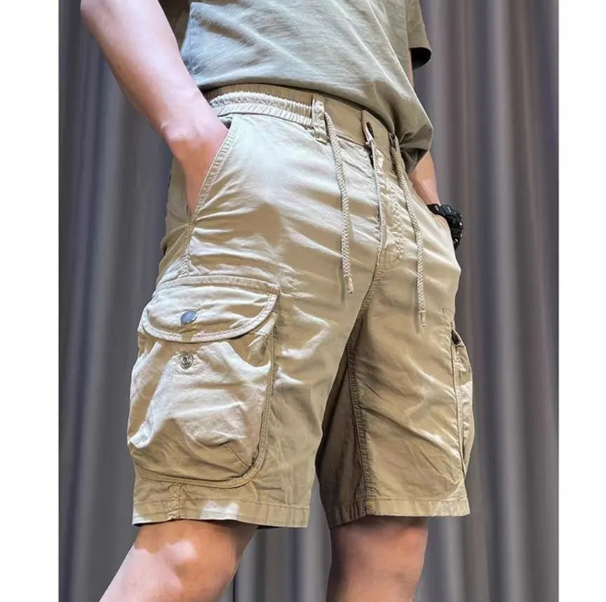 Loose straight cut casual overalls pants with multiple pockets in khaki colour.