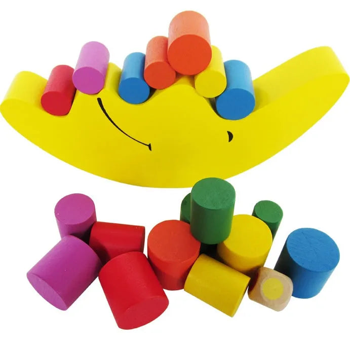 Moon-shaped wooden balance game with blue and yellow pieces for children aged 2-4 years