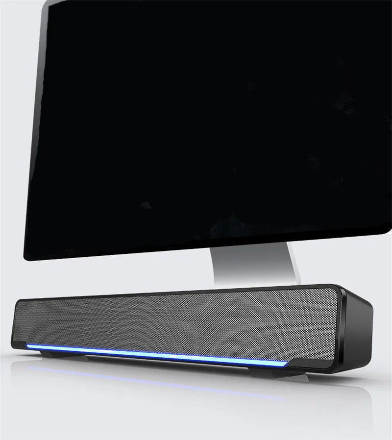 KH V196 plastic 2.0 computer speakers in black with trapezoidal mesh design and breathing light