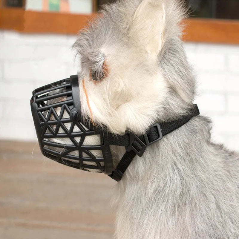 Plastic strong dog muzzle basket in beige on a white background, adjustable size 1-7 for dogs and cats