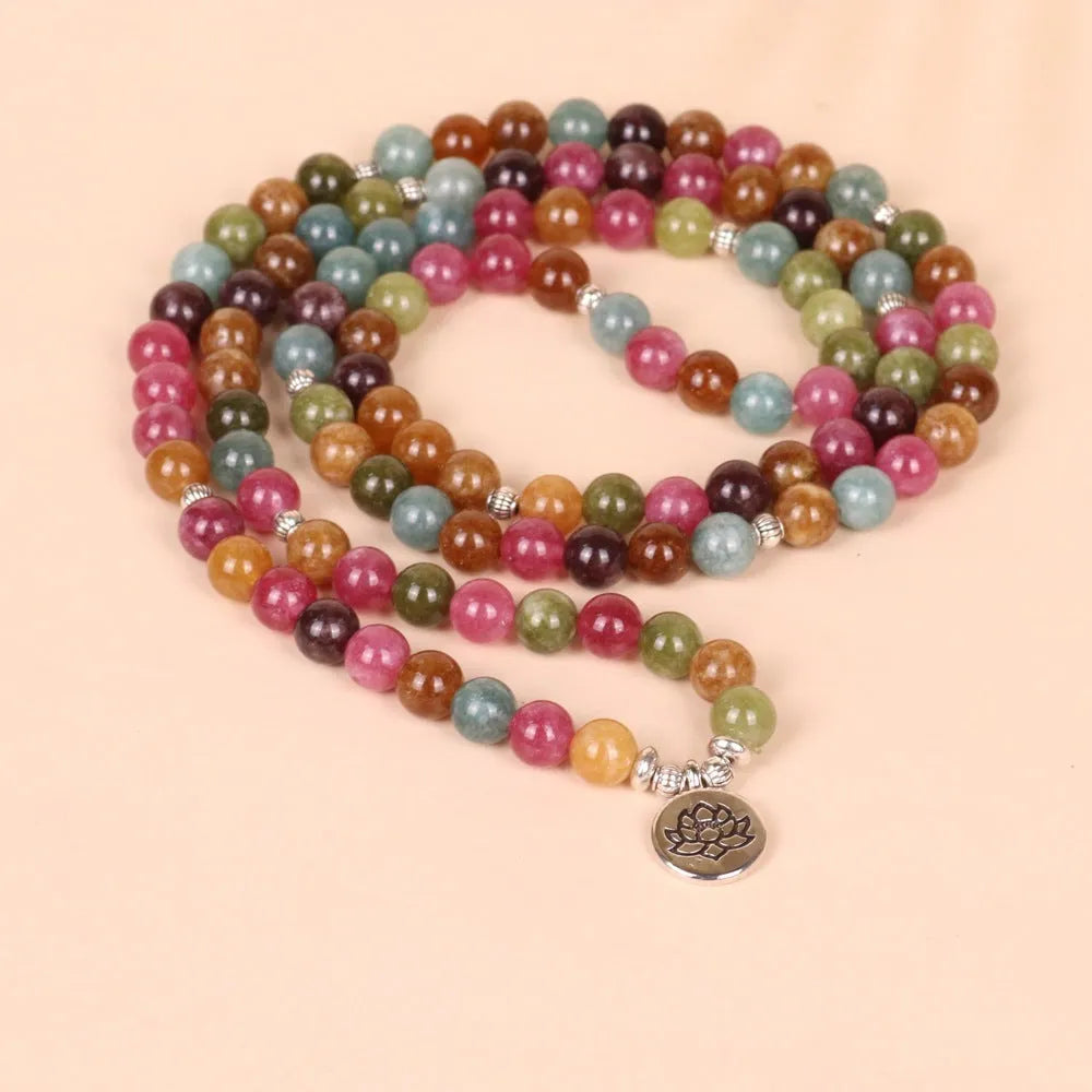 108 bead lotus multi-layer bracelet with tourmaline colour alloy construction and hanging charm