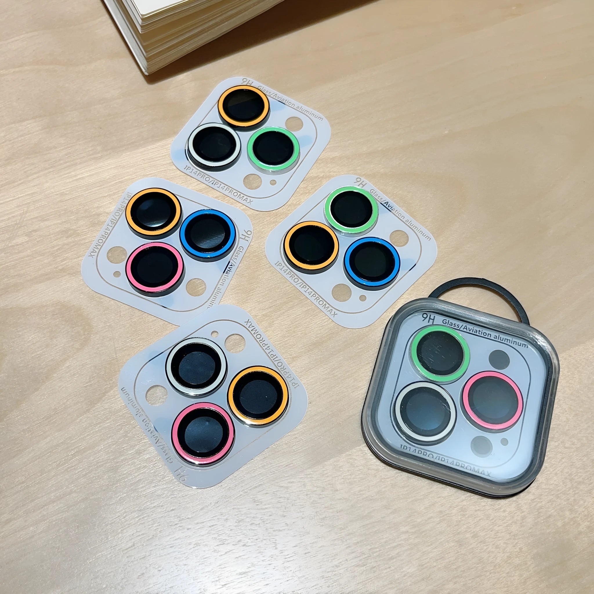 Tempered glass luminous lens protector for iPhone 14 Pro three holes, HD clarity, yellow blue pink colour