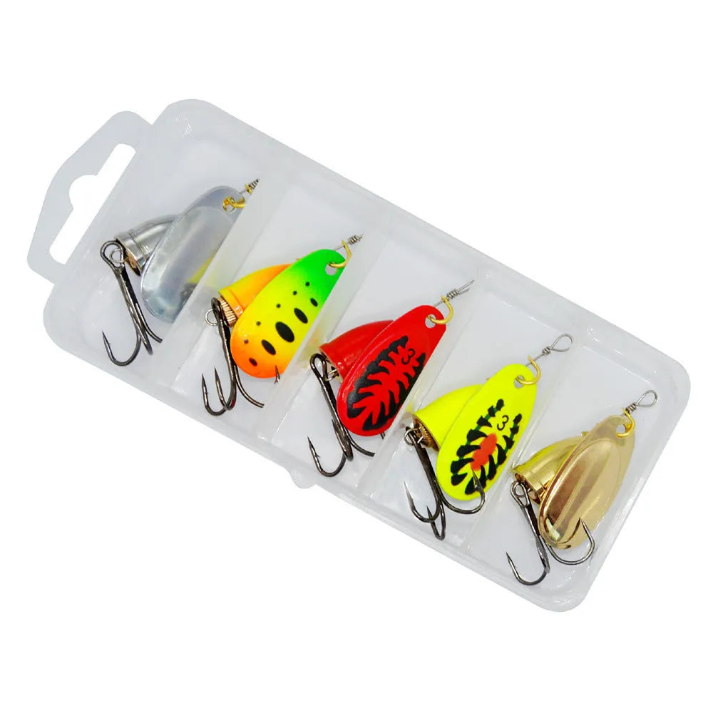 R-shaped metal fishing lure with rotating sequins and copper bell in gold, silver, red, yellow, and green colour variations
