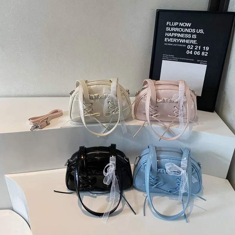 Women's bandage bow handbag in PU leather with phone compartment and sewing thread detail