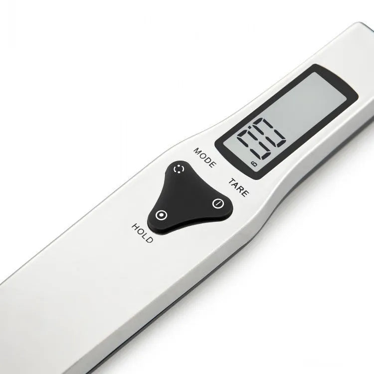 Smart digital measuring spoon kitchen scale with LCD display showing weight measurement