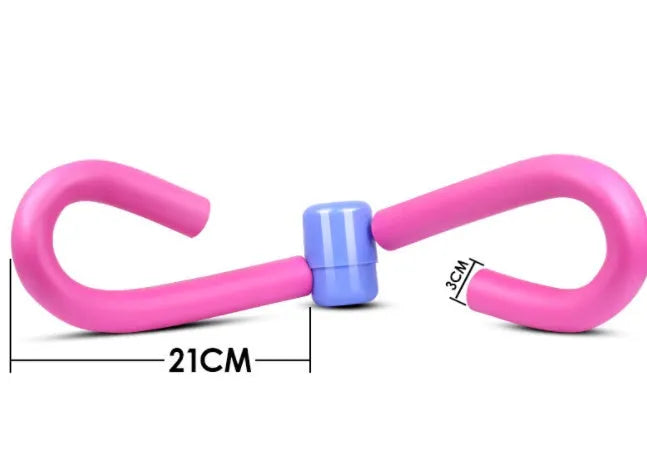 Pink PVC leg training clip with foam padding and steel spring for gym and home workouts.