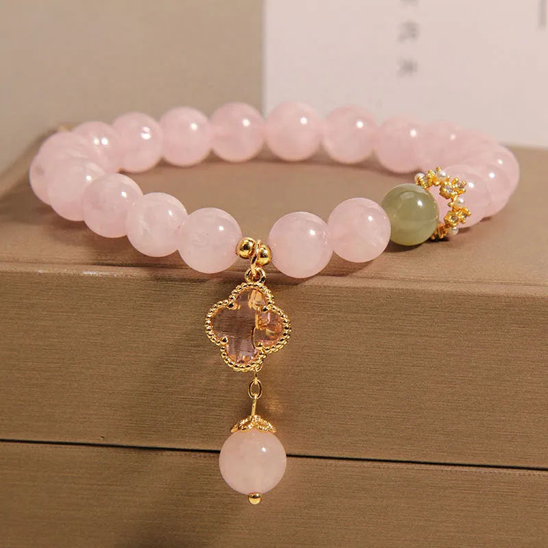 Pink crystal four-leaf clover pendant women's bracelet with alloy inlay and rhinestone details