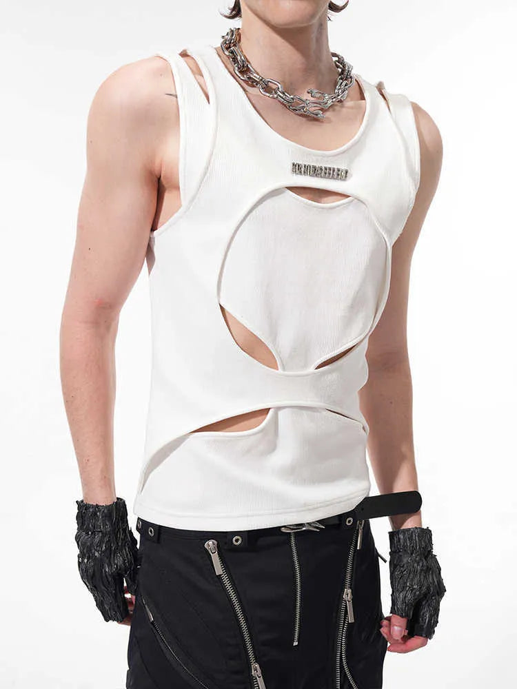Man wearing a loose-fitting black sleeveless waistcoat with a round neck, made from a lightweight hollow thread fabric.