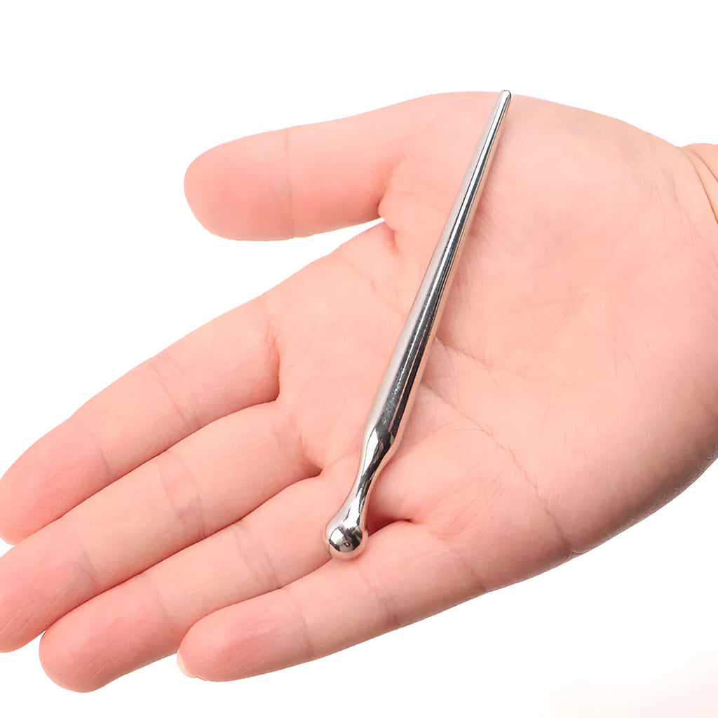 Silver metal urethral stimulation plug with round beads and a horse eye stick handle base.