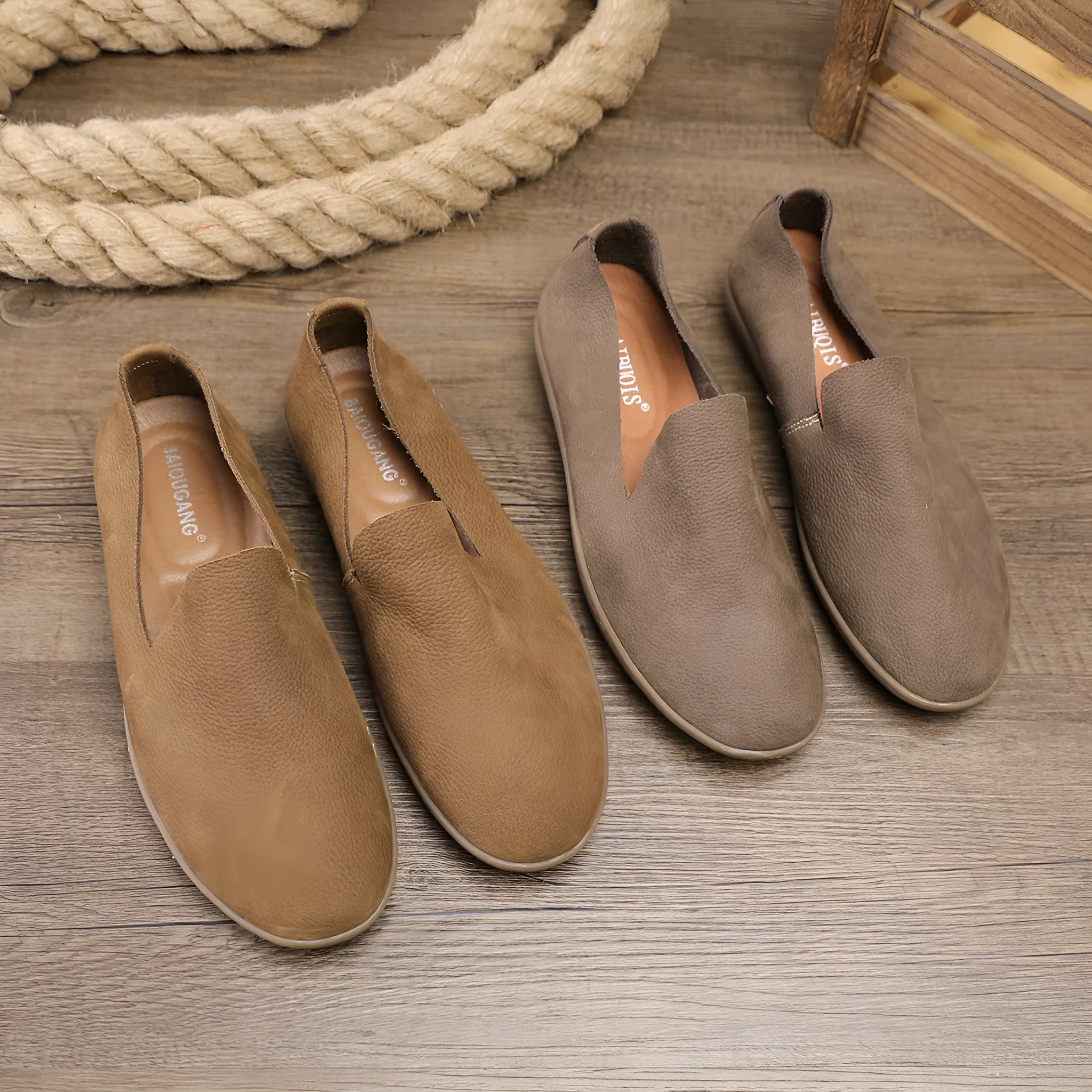 Handmade low top men's shoes in khaki or grey with a flat wedge heel and rubber sole.