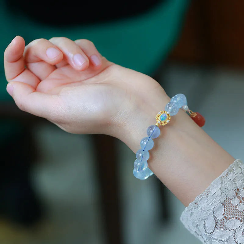 Aquamarine Chinese Fengjiu style bracelet with fox design and pink crystal accents for women