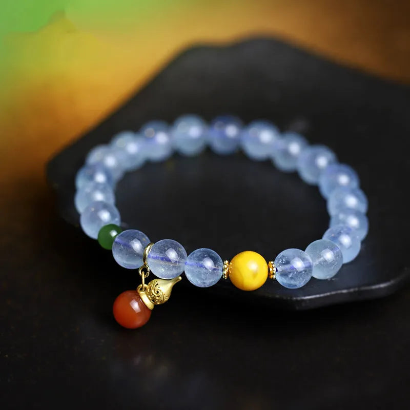 Iced aquamarine crystal bracelet with 8mm geometric beads and ethnic retro styling