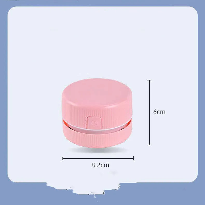 Blue mini desktop vacuum cleaner for pencil eraser chips and keyboard crumbs