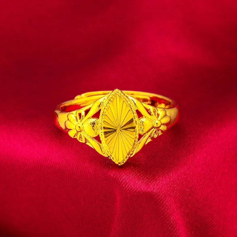 Geometric open flower ring with gold electroplated finish and textured brass surface