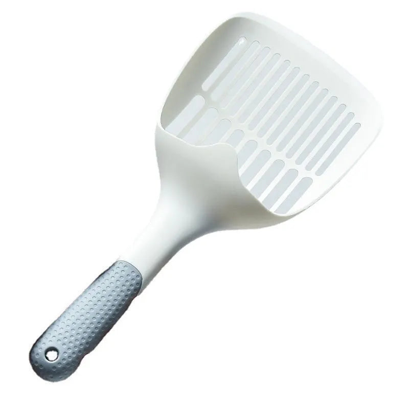 White plastic cat litter scoop with a storage base, shown with dimensions 29.5cm by 12.8cm.