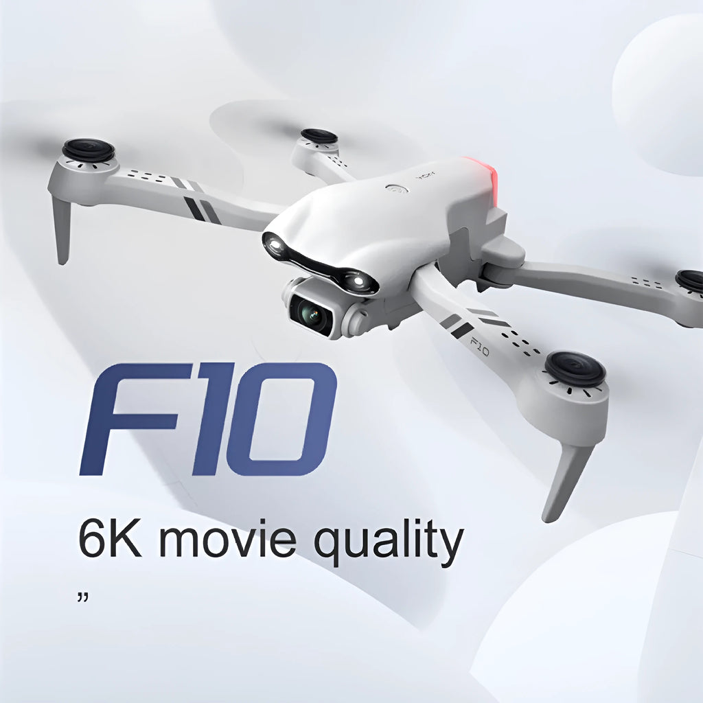 F10 folding GPS drone with 6K dual camera unfolded on a table showing propellers and camera