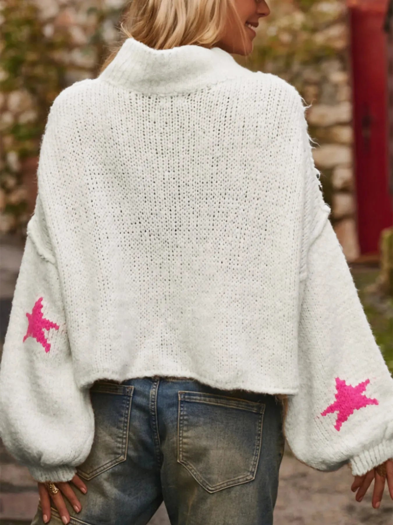 White women's loose turtleneck pullover sweater with a five-pointed star pattern in imitation velvet fabric.