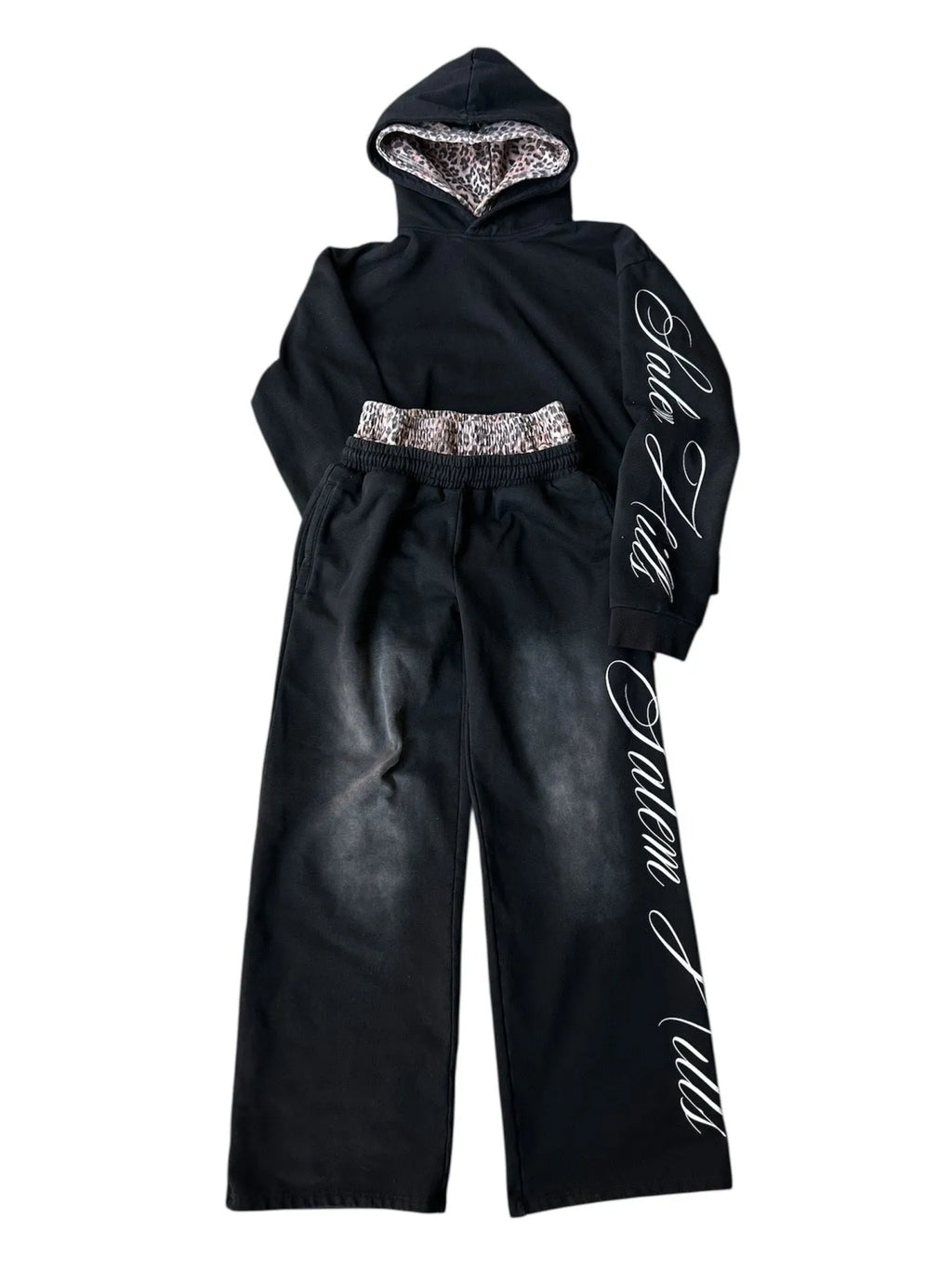 Men's grey punk print pullover hoodie and matching trousers laid flat.