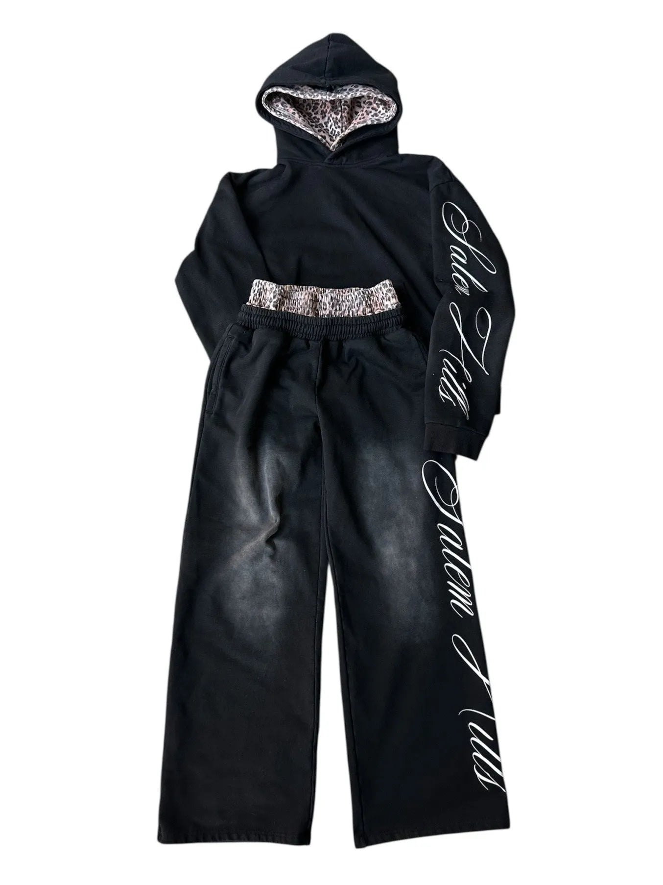 Men's grey punk print pullover hoodie and matching trousers laid flat.