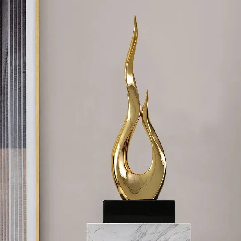 Resin high-rise festival decoration ornament in bright gold colour with modern simple styling