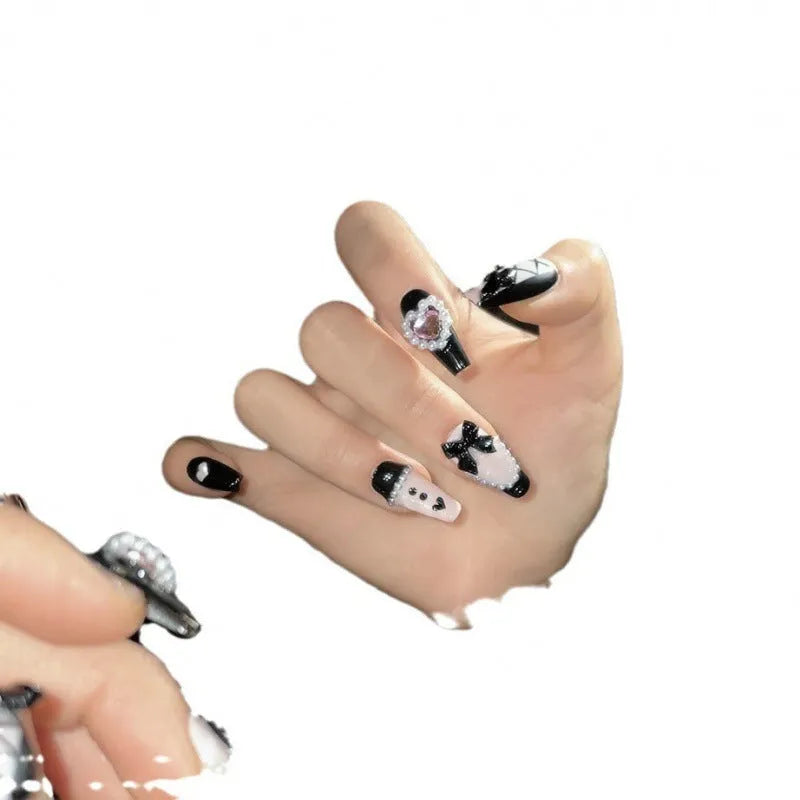 Black pink heart hand-painted artificial nails with bow patterns and cat's eye finish