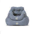 Canvas pet car seat cushion in striped pattern, set on a car seat with raised sides