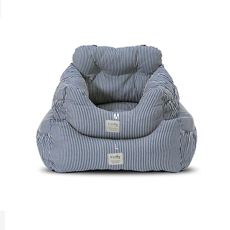 Canvas pet car seat cushion in striped pattern, set on a car seat with raised sides