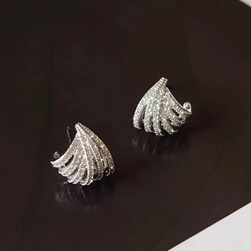 Geometric zircon earrings with platinum electroplated finish and line design
