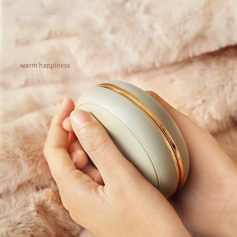 Brown portable USB power bank with 10000mAh capacity and hand warmer function showing USB-C port