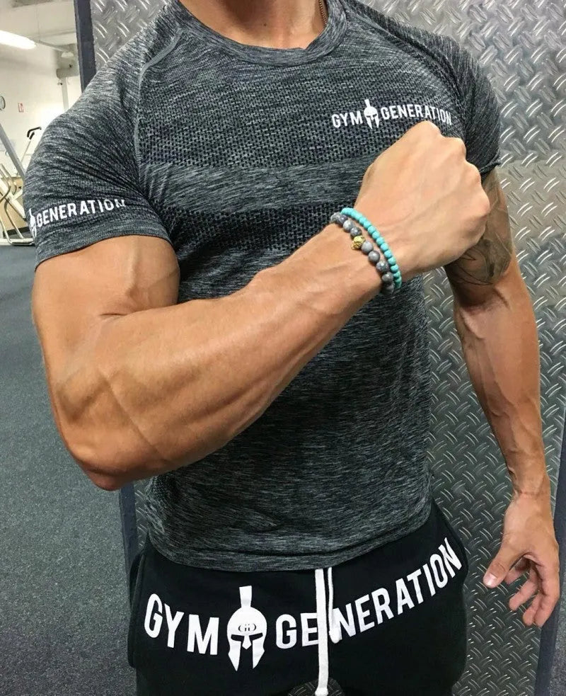 Short sleeve polyester workout top in orange, blue, grey, or light grey, sizes M to XXXL with size chart.