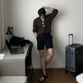 Men's straight-leg casual shorts in khaki, shown laid flat.