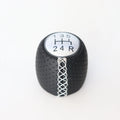 Sewn wrapped perforated leather gear knob for Alpha car in black, red, or white with matte or silver cover.
