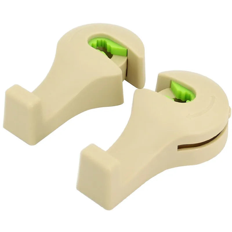 Creative car seat hook in black, made of ABS and silicone, holding a bag with 10KG capacity, pack of 2