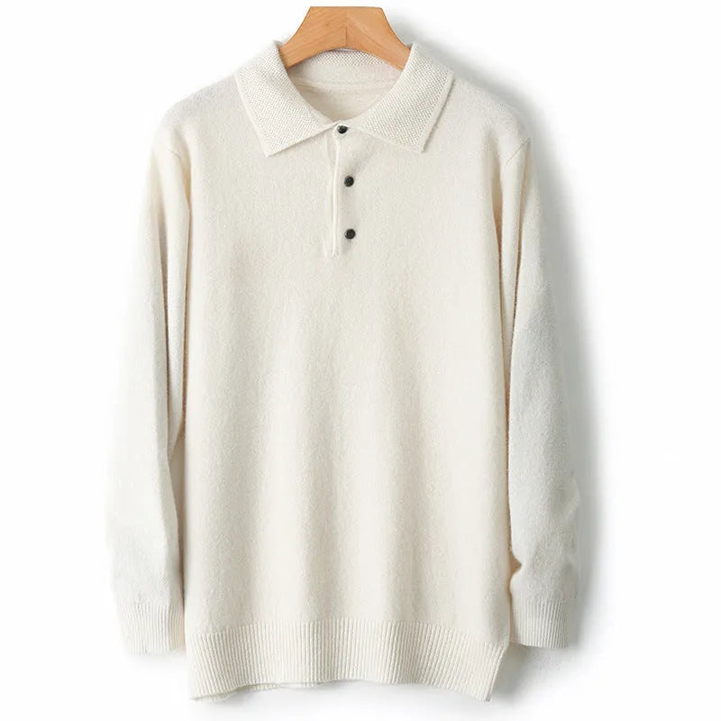 Man wearing a grey woolen polo collar sweater pullover with long sleeves.
