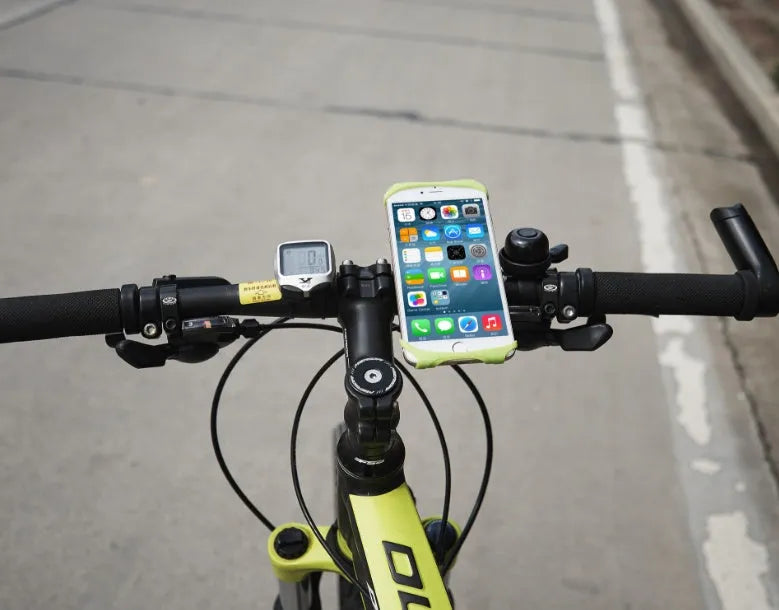 Silicone bicycle phone holder mounted on handlebar showing three-hole adjustment system