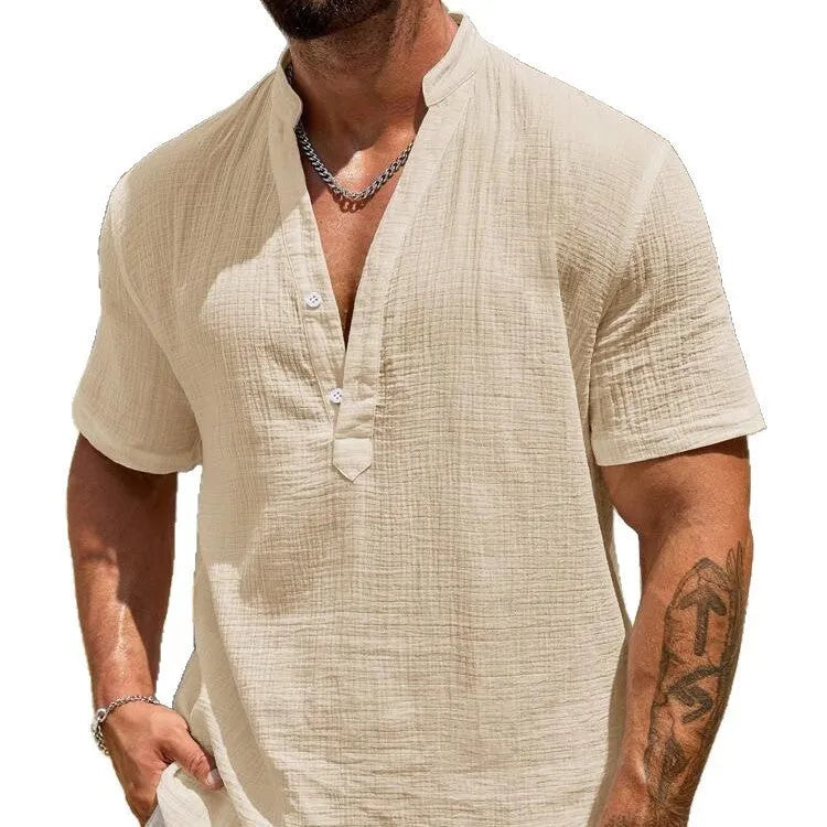 Men's solid colour stand collar short-sleeved casual shirt laid flat, showing thin fabric and slit detail.
