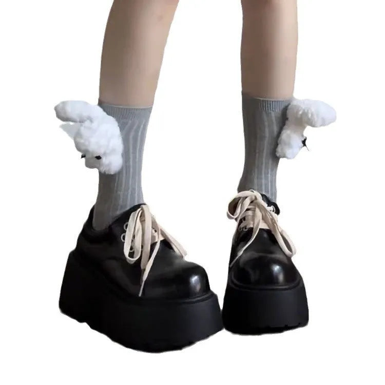 Matte black women's lace-up high-heel shoes with a thick sole and an English muffin heel.