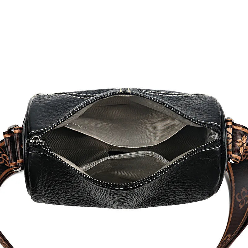 Genuine leather women's cylindrical shoulder bag with stitched patchwork, zip pocket, phone pocket and document pocket