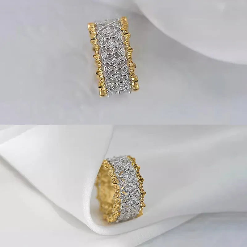 Geometric round two-tone zircon ring on a copper band, showing electroplated finish.