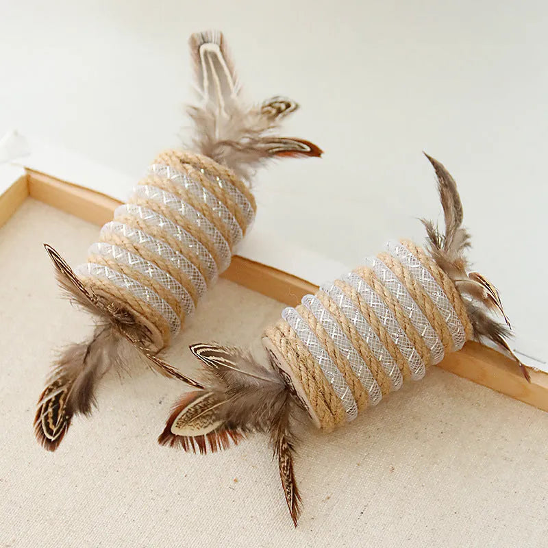 Beige cat toy with feathers, hemp rope scratching area and a central sound roller for pet claw play.