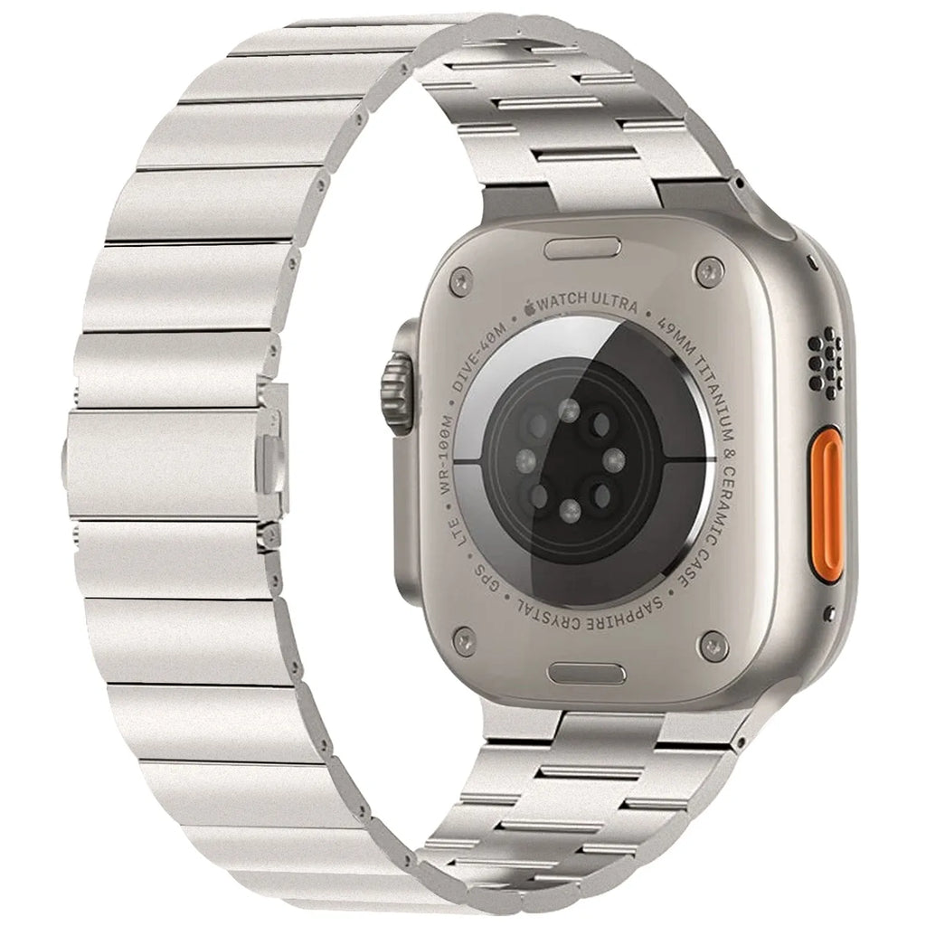 Stainless steel metal watch band for iWatch 38mm to 49mm in silver finish on table
