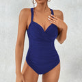 Women's solid colour one-piece swimsuit in polyester fabric with spandex lining.