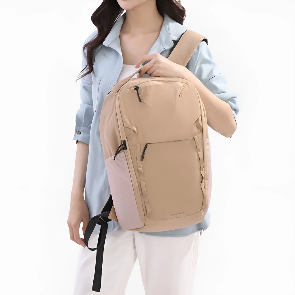 Beige Taslan composite cloth casual backpack with curved shoulder strap on a white background.