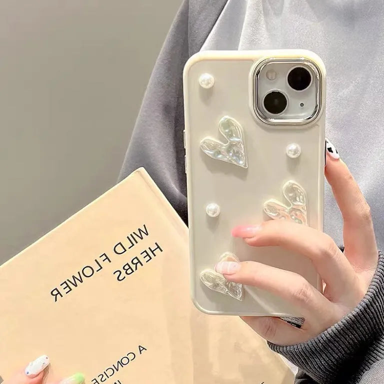 Milky white TPU phone case with pleated heart pattern and small pearl embellishments for iPhone