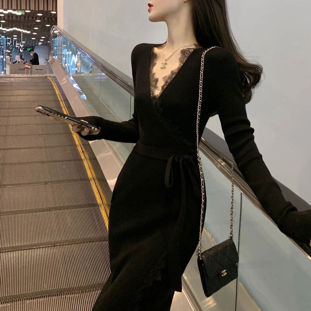 Black women's slim fit woolen skirt dress with a midi length and princess cut.
