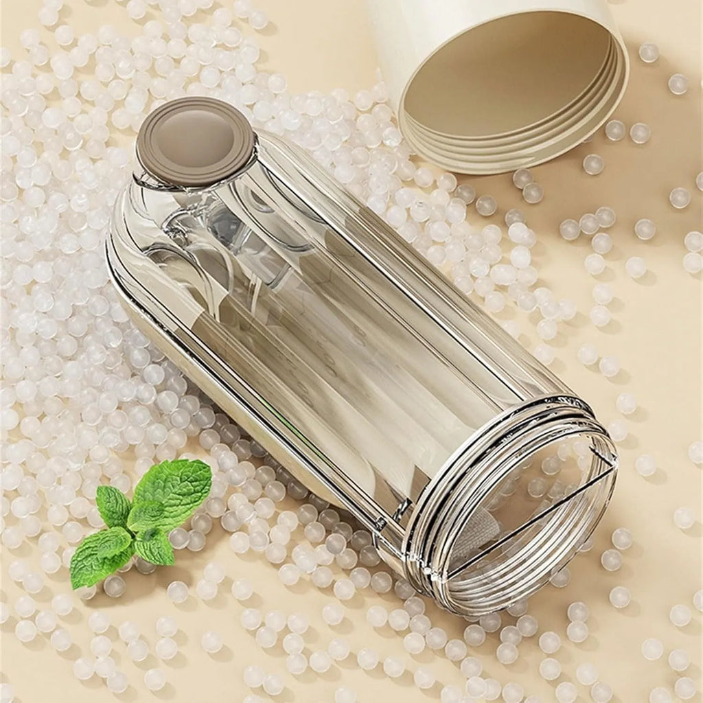 Beige foldable dog water bottle and food dispenser with press mechanism, shown next to a green version.