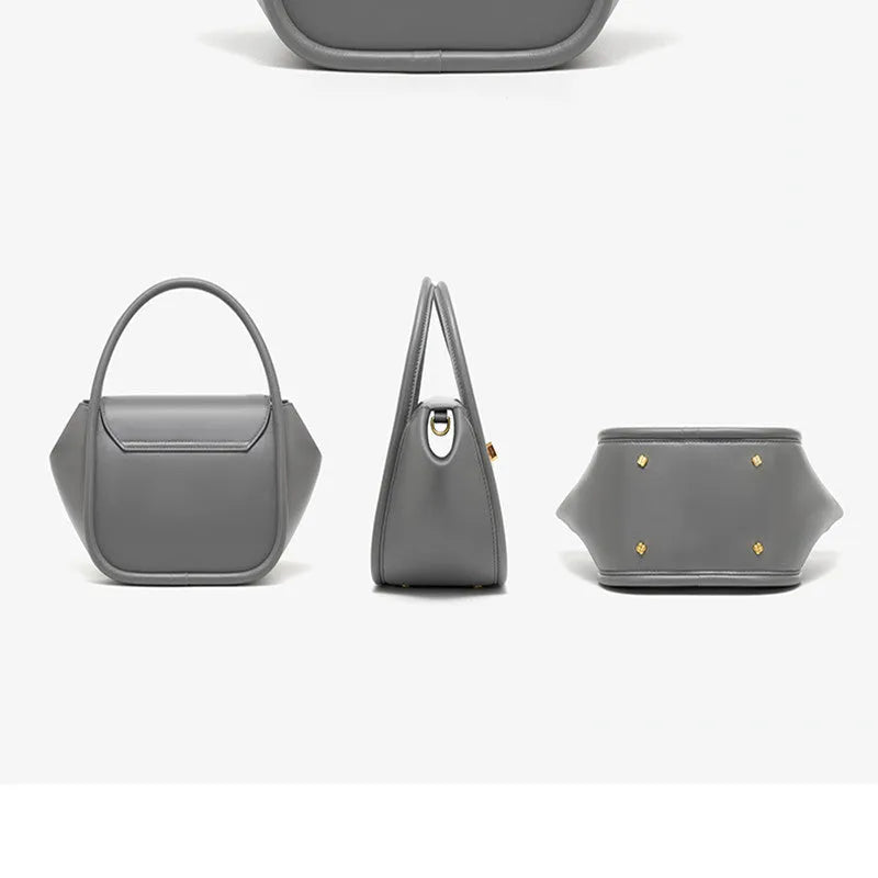 Women's leather wing shape tote bag with cross-body strap in four colour options showing buckle detail