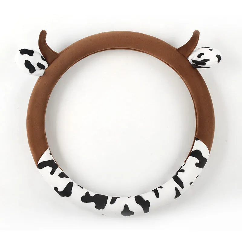 Short plush steering wheel cover with protective handle section in black colour