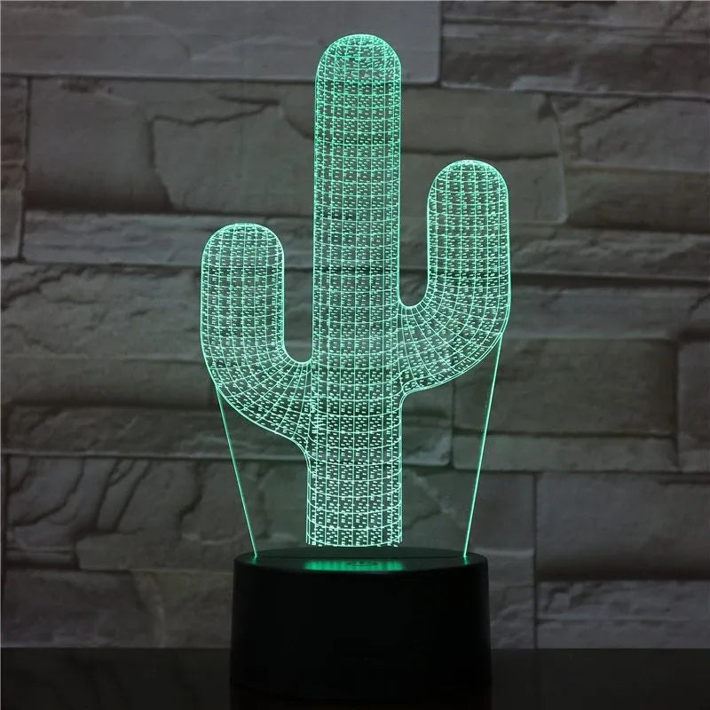 Cactus LED night light with 3D illusion board showing green glow on a table