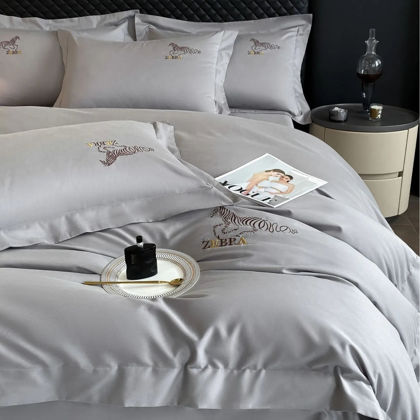Solid colour pure cotton four-piece bedding set with light brushed finish on a bed in a modern bedroom